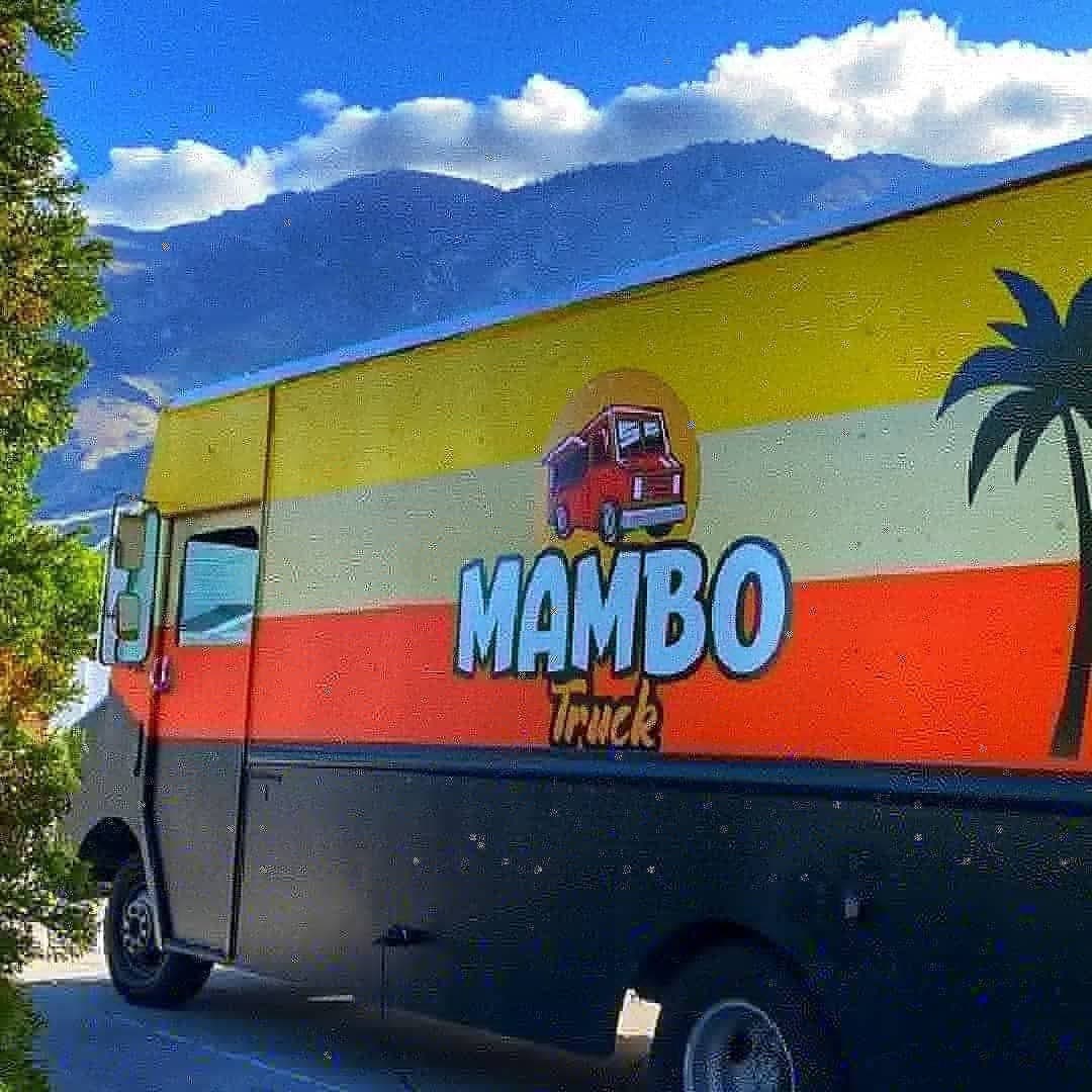 The Mambo Truck food truck parked in front of the Utah mountains