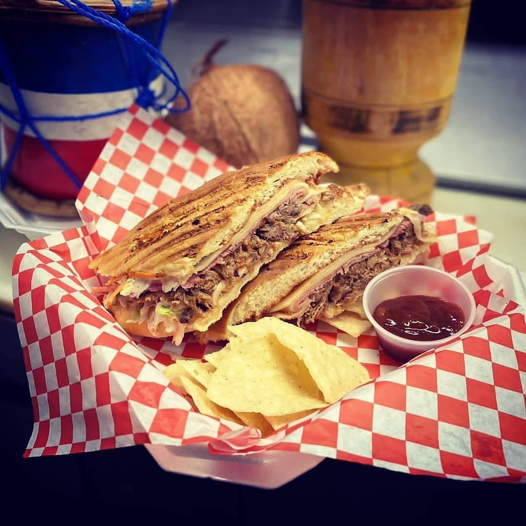 A Mambo Truck sandwich basket with chips